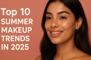 Young Indian woman showcasing the top 2025 summer makeup trends with dewy skin, glossy lips, and pastel eyeshadow on a vibrant coral background.